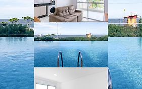Aptos Pé na Areia Vista Mar Condomínio Resort Completo com Piscina borda Infinita, Beach Tennis, Academia, Sala de Jogos, Brinquedoteca, Playground e Portaria 24H 3 Quartos com Ar-Condicionado, Churrasqueira Privativa Reserve Agora e Viva essa Experi